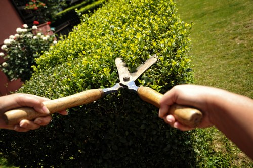 Restoring metal and timber fencing in Barbican area